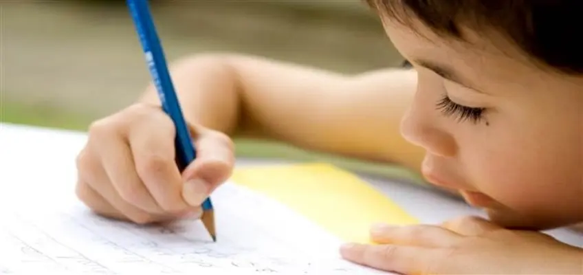 A child writing on a paper